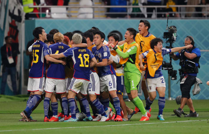Players of Japan pictured celebrating during their 2-1 win over Germany at the 2022 FIFA World Cup in Qatar